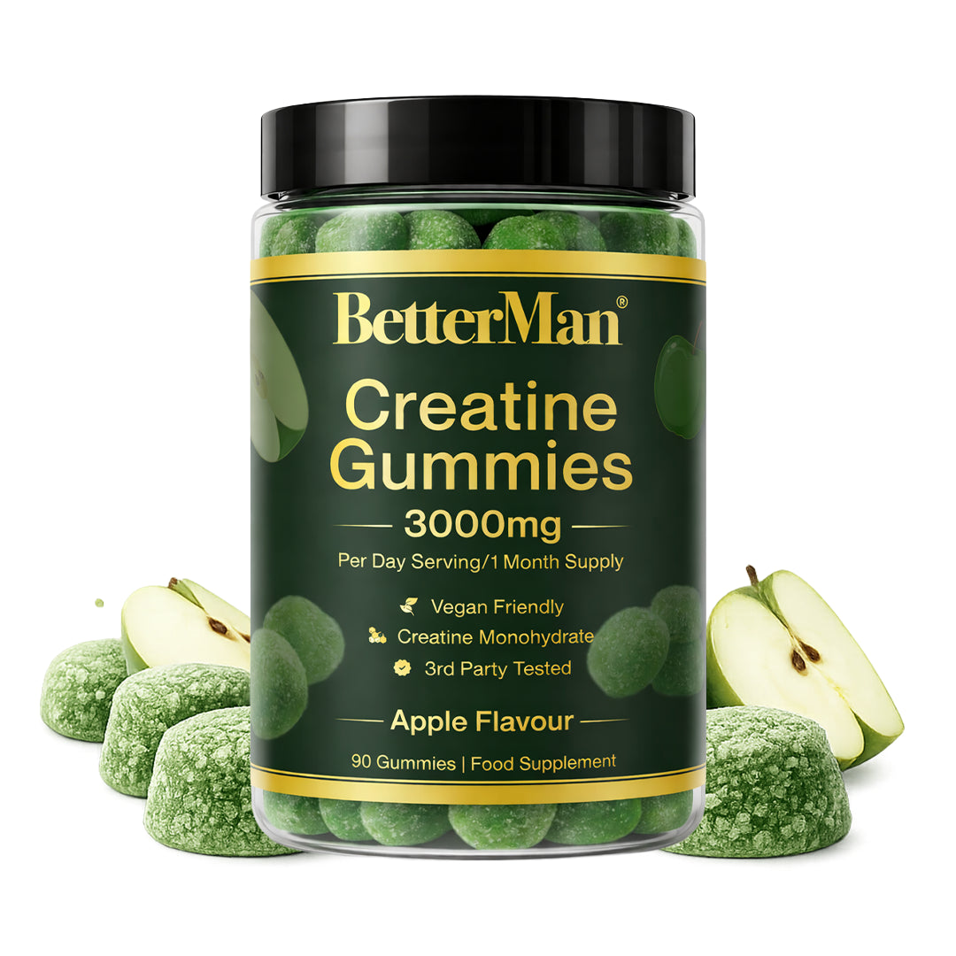 Jar of BetterMan Creatine Gummies with green gummies and apples on a white background