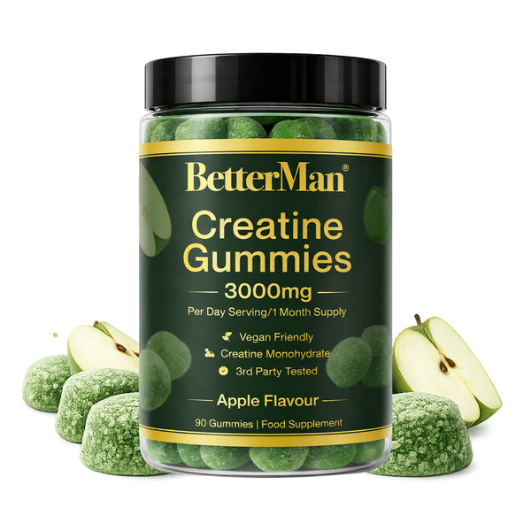 Jar of BetterMan Creatine Gummies with green gummies and apples on a white background